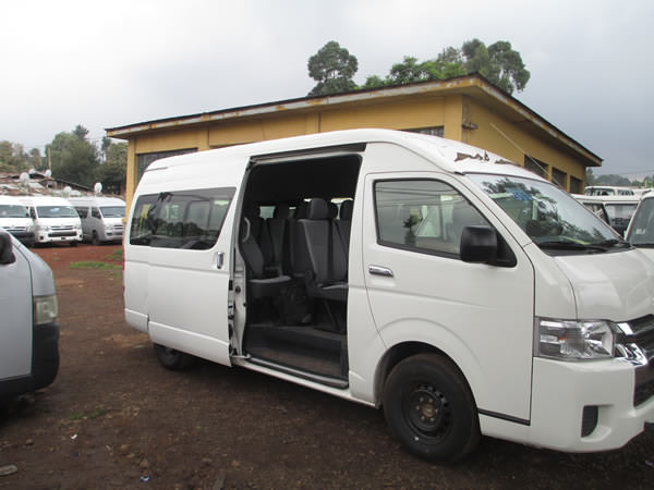 White minibus with side door open
